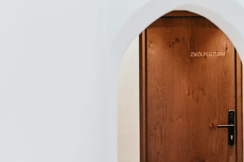 Double Room (Zwölferturm) | In-room safe, desk, laptop workspace, blackout drapes