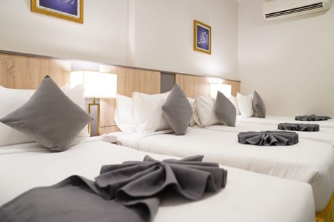 Standard Quadruple Room | In-room safe, iron/ironing board, free WiFi