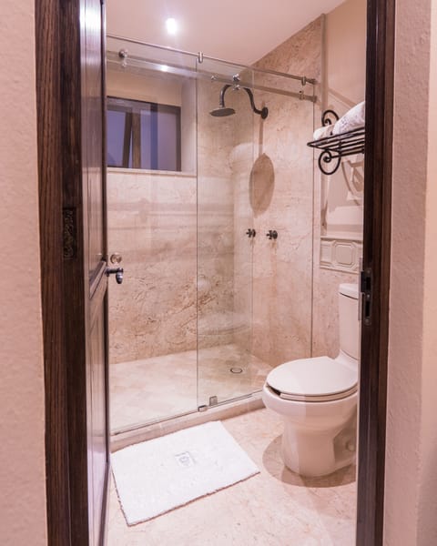 Family Room | Bathroom | Shower, rainfall showerhead, towels, soap