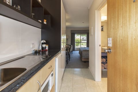 Executive Room | Private kitchen | Fridge, microwave