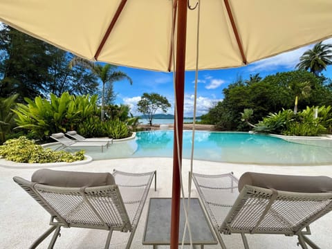 Outdoor pool, pool umbrellas, sun loungers