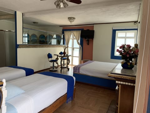 Family Room | Down comforters, iron/ironing board, free WiFi, bed sheets