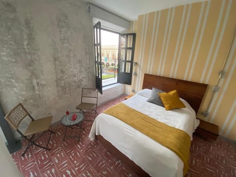 Deluxe Room, Balcony, City View | Individually decorated, individually furnished, desk, laptop workspace