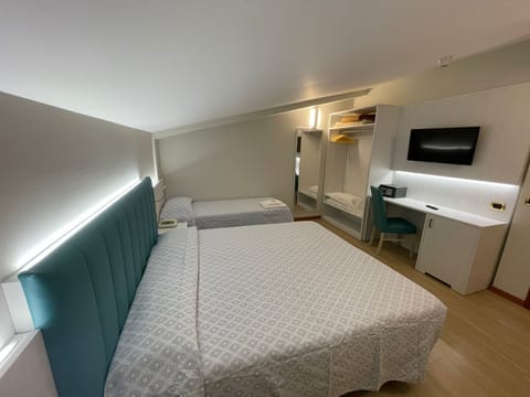 Standard Triple Room | Premium bedding, minibar, in-room safe, desk