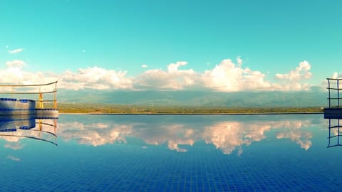 Outdoor pool, pool umbrellas, sun loungers