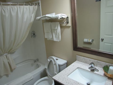 Standard Room, 2 Queen Beds with outside access | Bathroom | Combined shower/tub, hair dryer, towels