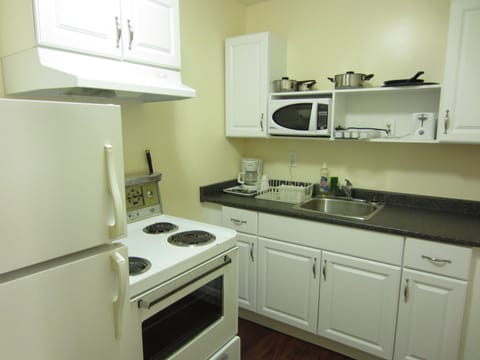 Suite, 2 Double Beds, Kitchenette | Private kitchen | Microwave, coffee/tea maker