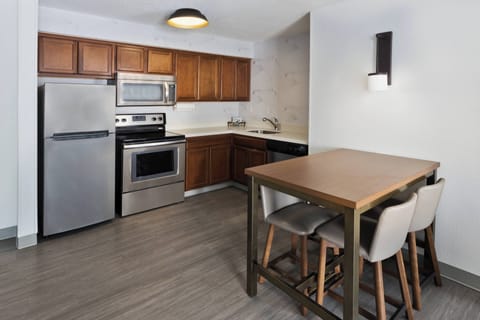 Suite, 2 Bedrooms | Private kitchen | Full-size fridge, microwave, stovetop, dishwasher