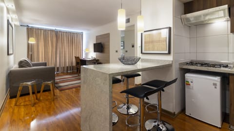 Superior Apartment, 1 Bedroom (2 Twin Beds) | Living area | 32-inch TV with cable channels