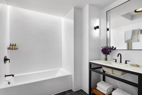 Suite (Manhattan) | Bathroom | Shower, designer toiletries, hair dryer, bathrobes