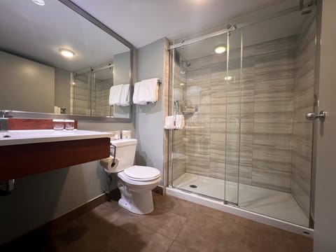 Comfort Room, 2 Double Beds | Bathroom | Combined shower/tub, free toiletries, hair dryer, towels