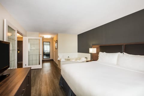 Suite, 1 Bedroom, Jetted Tub | Premium bedding, desk, laptop workspace, blackout drapes