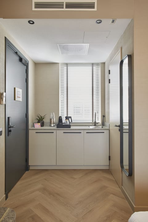 Comfort Room | Private kitchen | Fridge, electric kettle