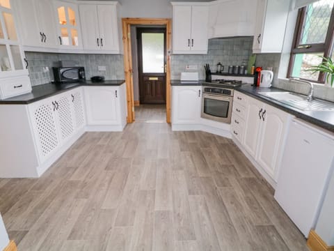 Fridge, electric kettle, toaster, cookware/dishes/utensils