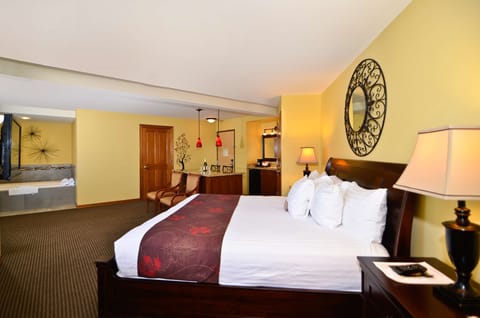 Suite, 1 King Bed, Non Smoking, Jetted Tub | In-room safe, desk, laptop workspace, iron/ironing board