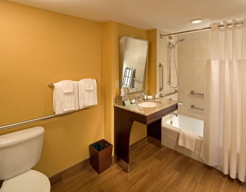 Room, 1 King Bed, Accessible, Bathtub (Mobility & Hearing) | Bathroom | Combined shower/tub, free toiletries, hair dryer, towels