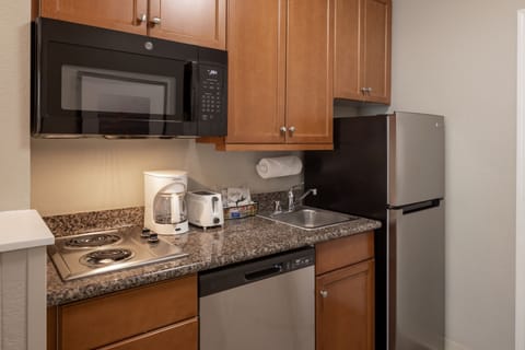 Studio Suite, 1 Queen Bed with Sofa bed, Non Smoking | Private kitchen | Full-size fridge, microwave, stovetop, dishwasher