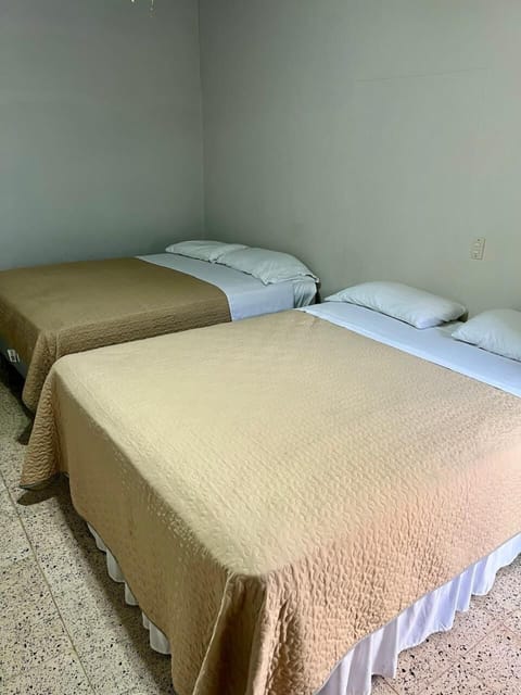 Basic Room, 2 Queen Beds | Free WiFi, bed sheets