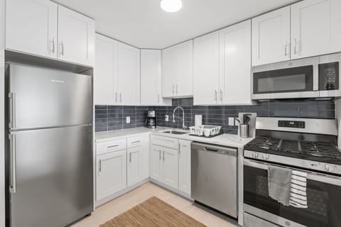 Comfort Condo, 2 Bedrooms | Private kitchen | Fridge, microwave, oven, stovetop