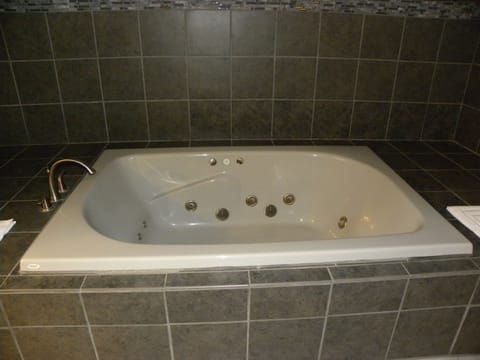 Suite, 1 King Bed, Jetted Tub | Jetted tub