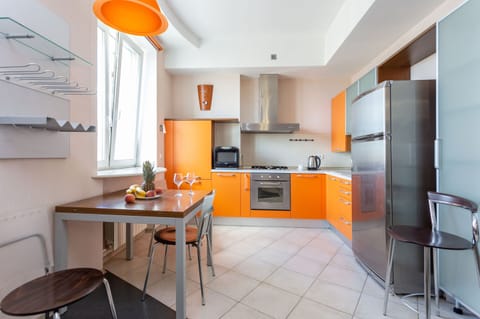 Standard Apartment | Private kitchen | Fridge, stovetop, electric kettle, cookware/dishes/utensils