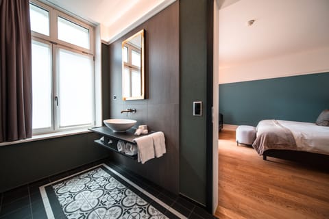 Eco-friendly toiletries, hair dryer, bathrobes, slippers