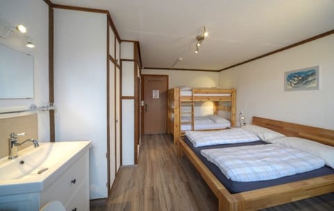 Standard Quadruple Room, Private Bathroom | In-room safe, desk, cribs/infant beds, free WiFi