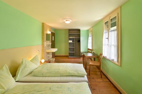 Triple Room, Shared Bathroom | Desk, iron/ironing board, cribs/infant beds, free WiFi