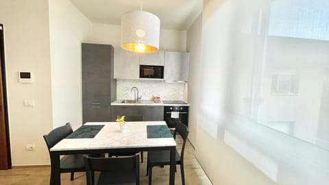 Comfort Apartment | Private kitchen | Full-size fridge, microwave, oven, stovetop