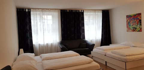 Family Quadruple Room | Minibar, desk, free cribs/infant beds, rollaway beds