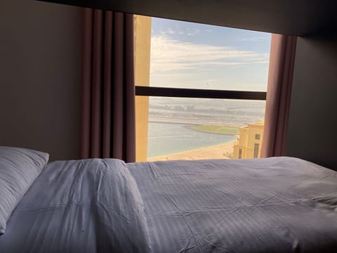 Bunk bed in a Comfort Shared Dormitory. Mixed. Max 8 people, Sea vew. | Beach/ocean view