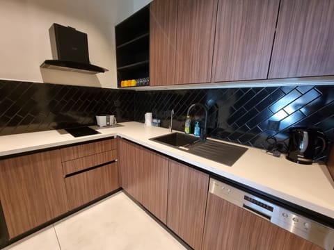 Design Apartment, 2 Bedrooms, 2 Bathrooms | Private kitchen | Full-size fridge, microwave, oven, stovetop