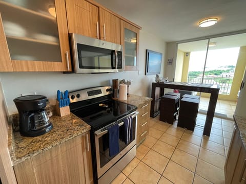 Family Apartment, 3 Bedrooms, Ocean View | Private kitchen | Full-size fridge, microwave, oven, stovetop