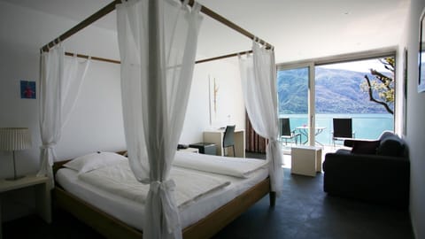 Junior Suite, Lake View | In-room safe, desk, soundproofing, free WiFi