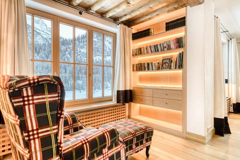 Luxury Chalet | Living area | 1-inch flat-screen TV with satellite channels, fireplace