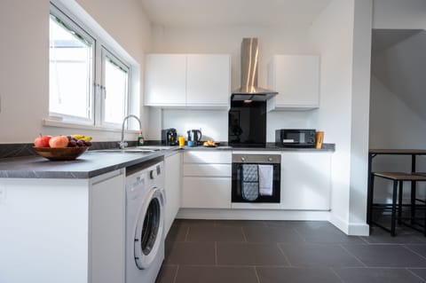 City House | Private kitchen | Full-size fridge, electric kettle, cookware/dishes/utensils