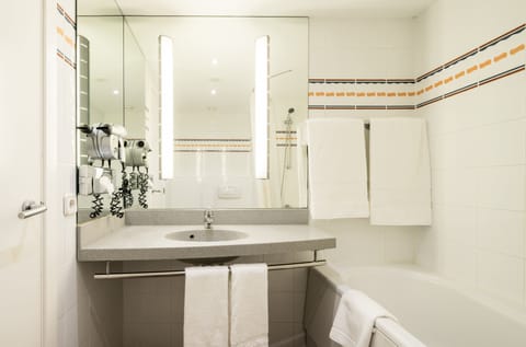 Eco-friendly toiletries, hair dryer, towels, soap