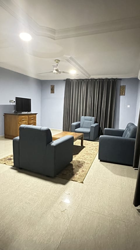 Family Suite, 2 Bedrooms | Living area | 32-inch flat-screen TV with cable channels