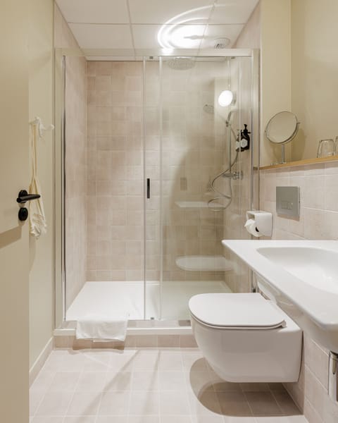 Standard Double or Twin Room | Bathroom | Shower, hair dryer, towels, soap