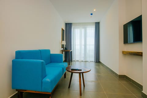 Asteria One-bedroom Suite | Living area | Flat-screen TV