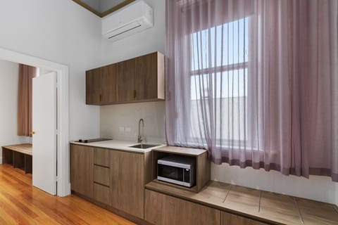 Standard Suite | Private kitchen | Microwave, stovetop, electric kettle, toaster