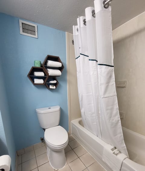 Studio, 2 Queen Beds, Non Smoking | Bathroom | Hair dryer, towels, soap, shampoo