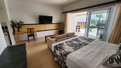 Deluxe Double Room, Poolside | Premium bedding, in-room safe, desk, laptop workspace