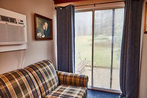 Executive Room, Patio (No pets) | Living area | 42-inch flat-screen TV with cable channels, Netflix, Hulu