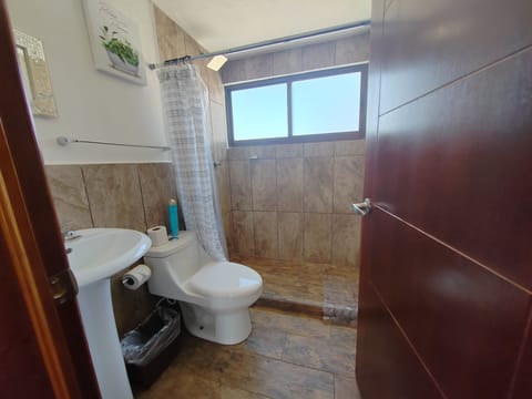 Family Cabin, Multiple Beds | Bathroom | Shower, rainfall showerhead, towels, soap