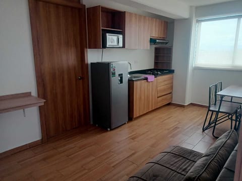 Suite | Private kitchen | Mini-fridge, microwave, coffee/tea maker, toaster