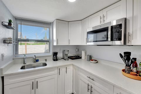 Studio, 1 Queen Bed, Patio, Garden View | Private kitchen | Fridge, microwave, coffee/tea maker, cookware/dishes/utensils