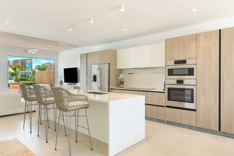 Deluxe Townhome, 2 Bedrooms (Boat House) | Private kitchen | Full-size fridge, microwave, oven, stovetop