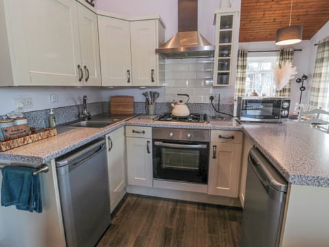 Fridge, electric kettle, toaster, cookware/dishes/utensils