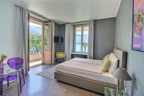 Junior Suite with Balcony, Garden & Lake View | Premium bedding, minibar, in-room safe, blackout drapes